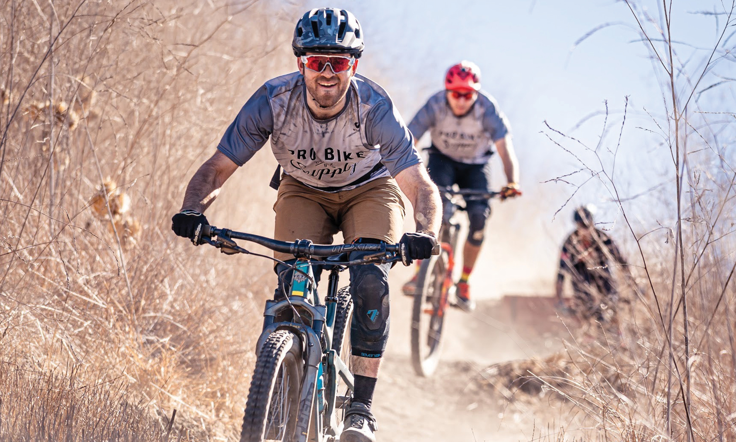 Mountain bikers on a dirt trail