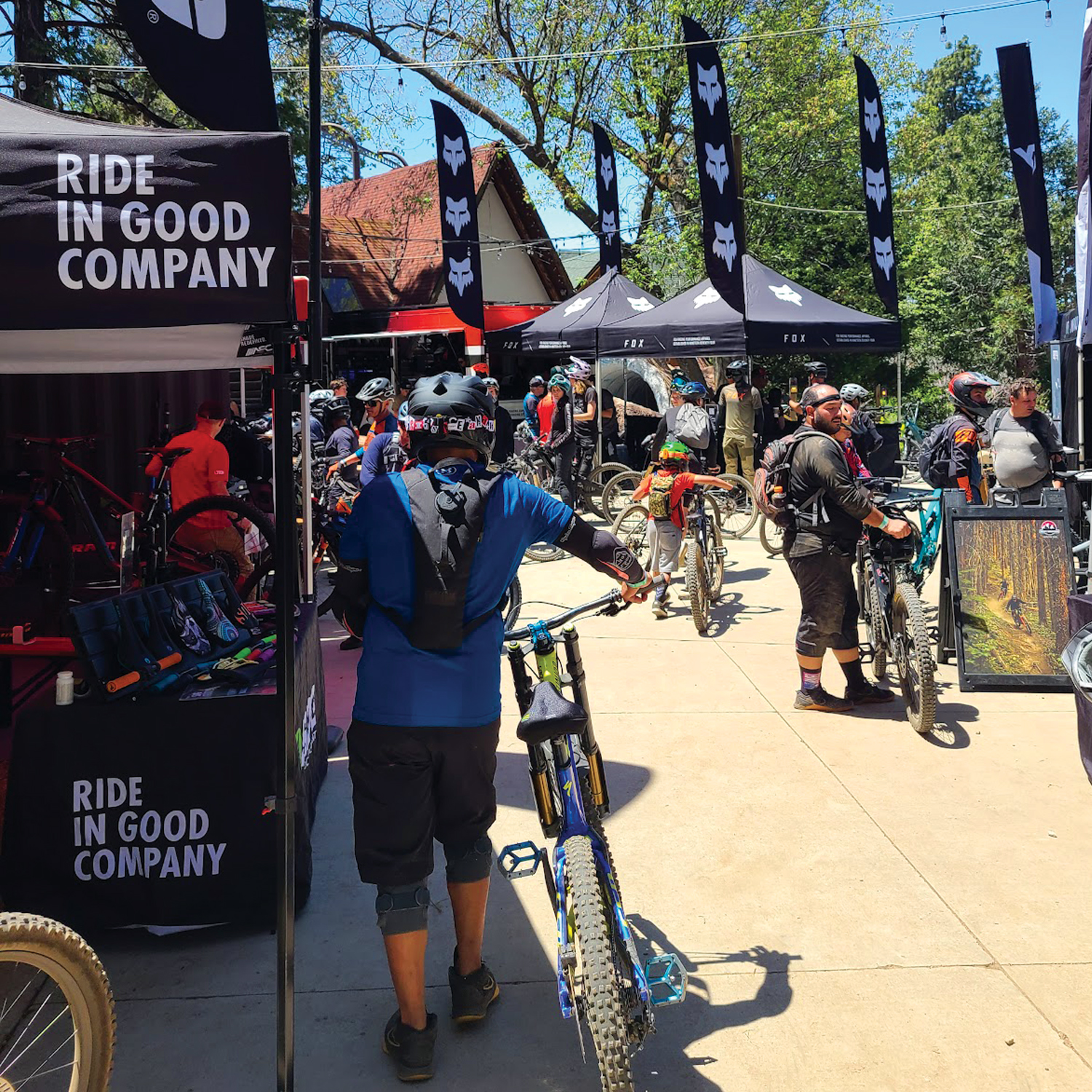 MTB Booths with flags and bike riders